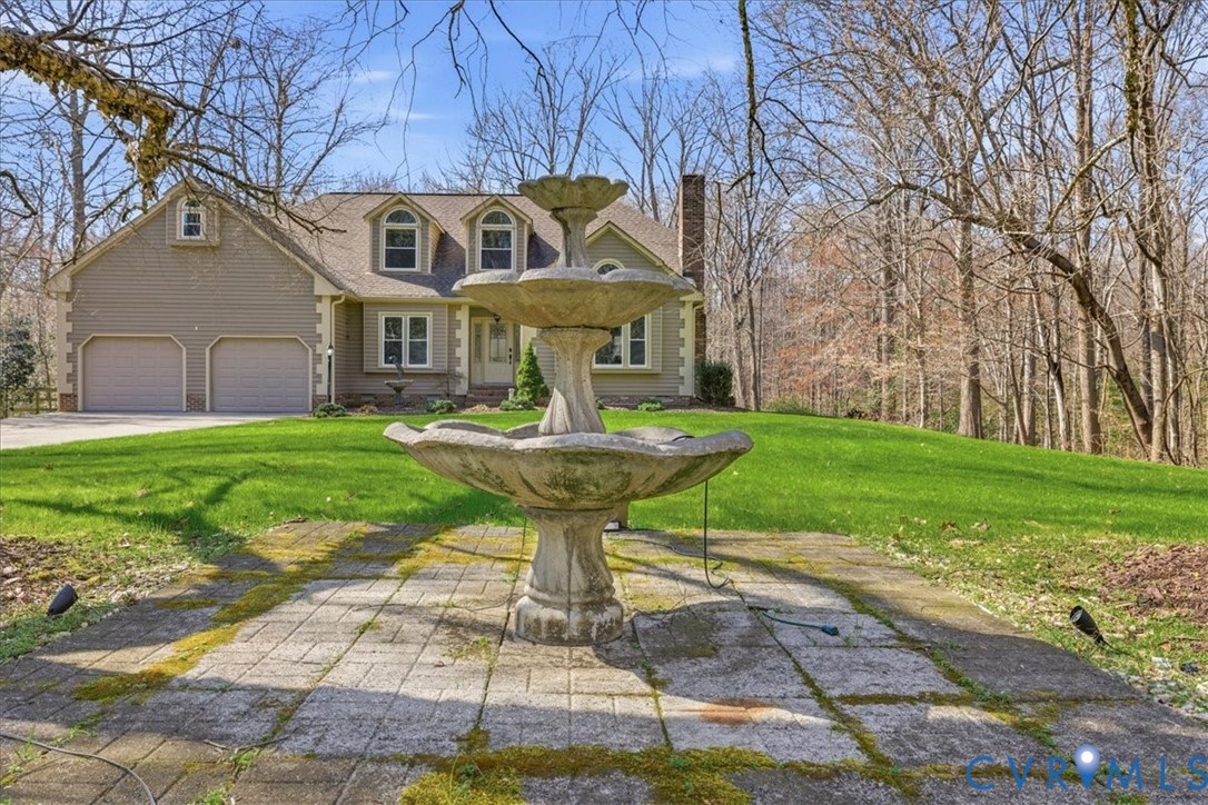 3520 Mill Road Hopewell, VA 23860 - Photo 3 of 51 front of house with three tier fountain