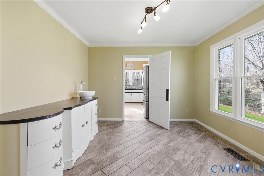 3520 Mill Road Hopewell, VA 23860 - Photo 10 of 51 dining room with repurposed dresser as a wet bar