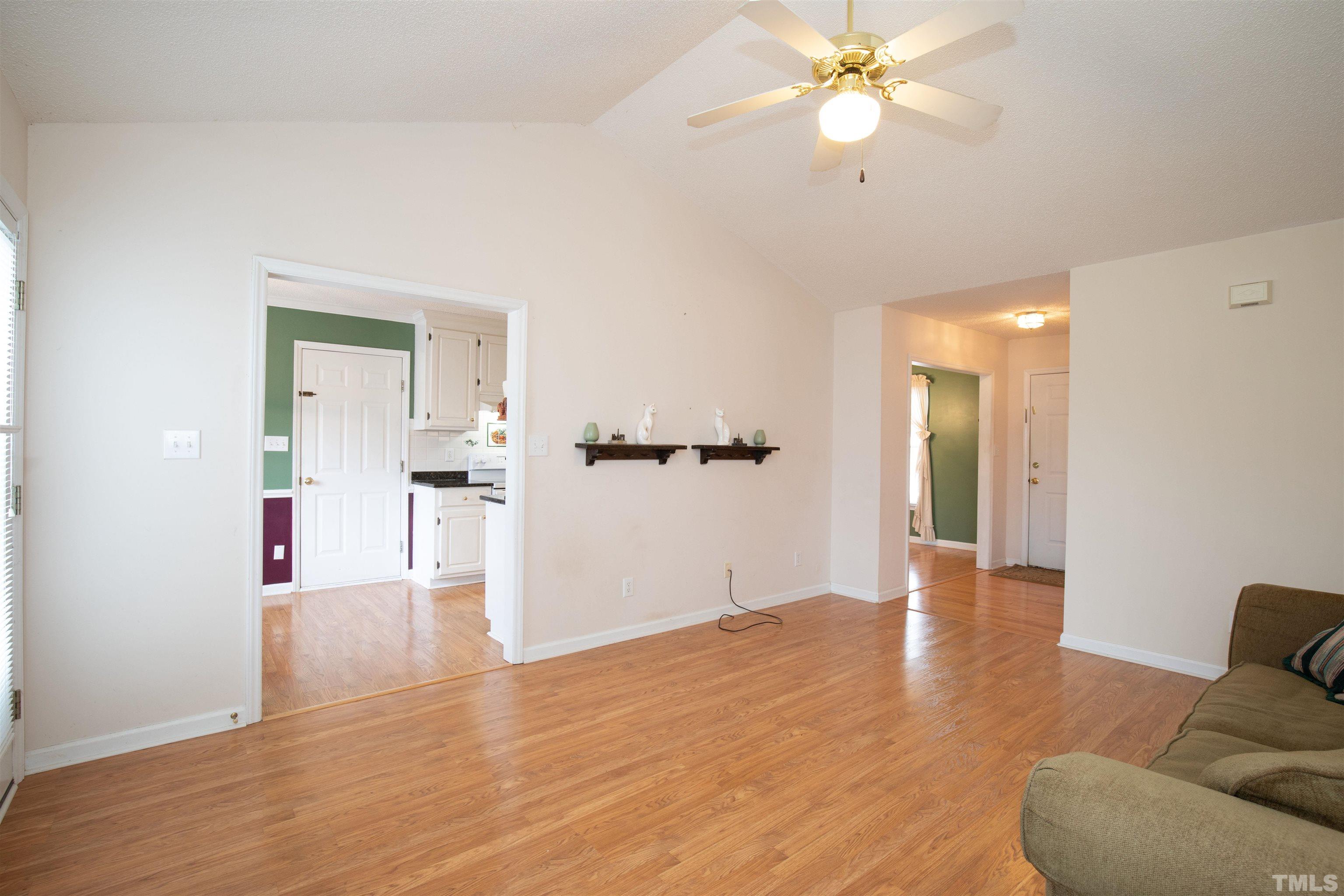 300 Sanders Road Benson, NC 27504 - Photo 11 of 24 a view of empty room with wooden floor