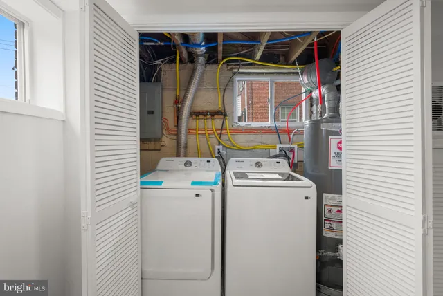 a utility room with dryer and washer