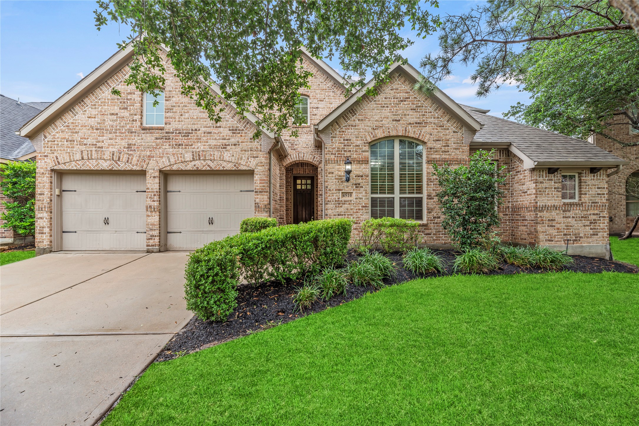 Welcome home to 4510 Cedarfield Road in the prestigious Cinco Ranch community of Katy! Mature trees and great curb appeal combine to create a welcoming atmosphere.