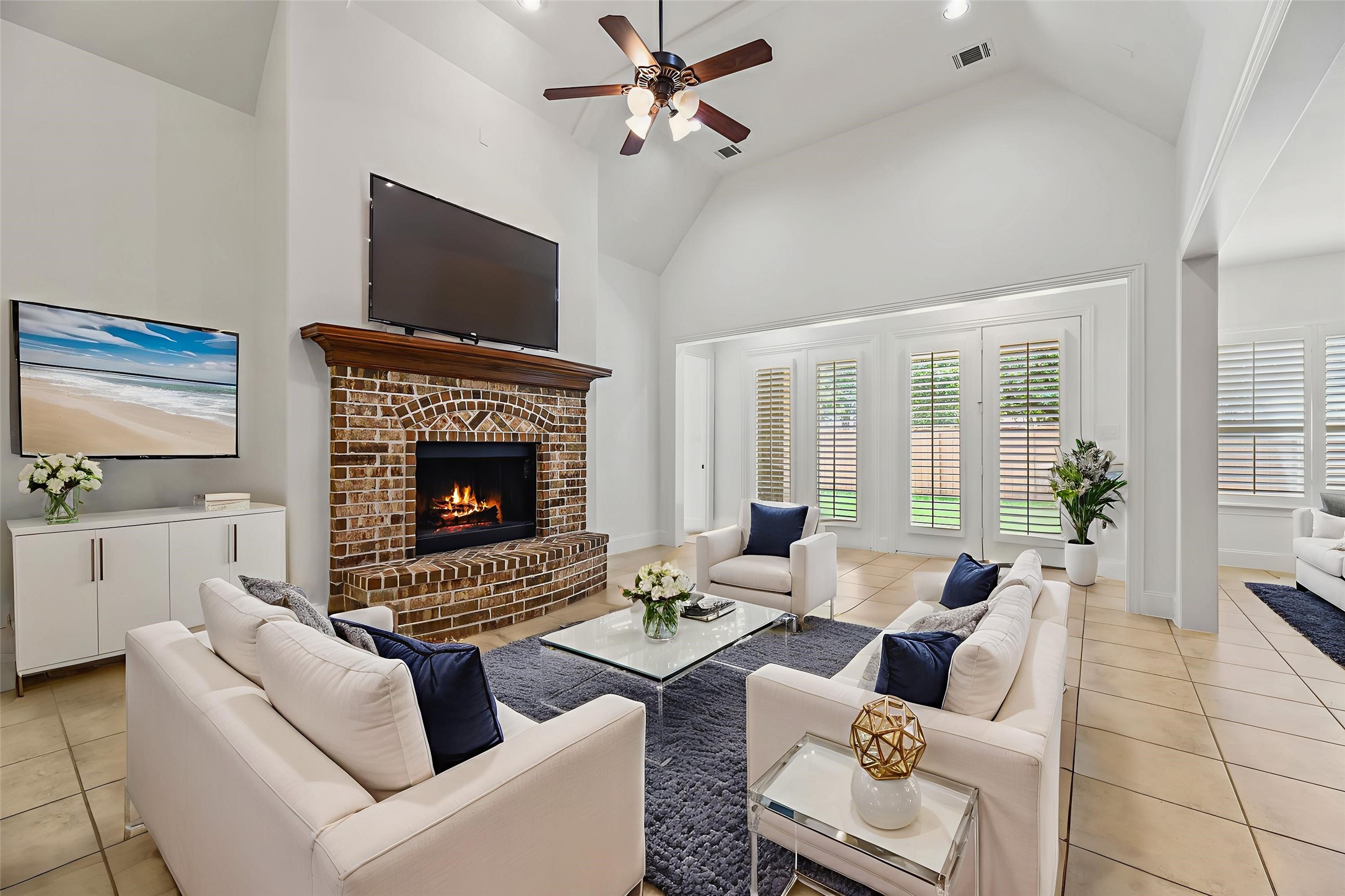 4510 Cedarfield Road Katy, TX 77494 - Photo 2 of 24 Step into the spacious living area, where the soaring, intricately designed ceilings that adds to the home’s overall charm and character.