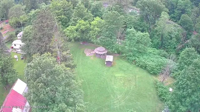 a bedroom with furniture and window