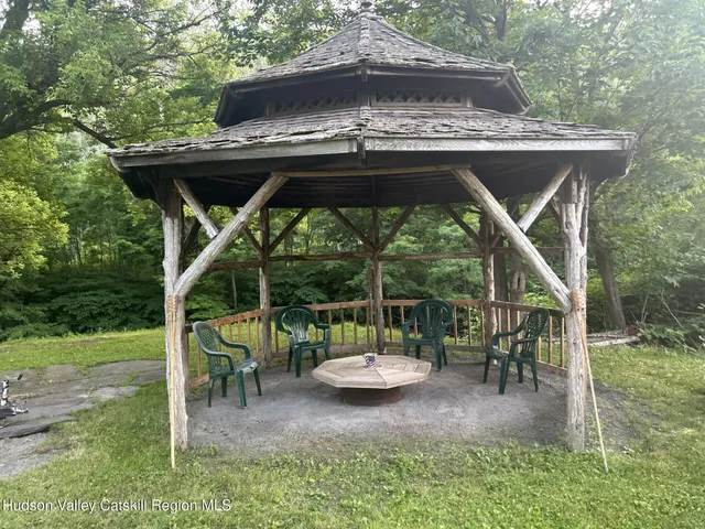 a view of a garden with a tree