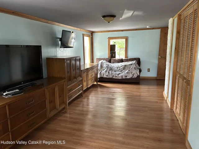 a view of a field with an trees