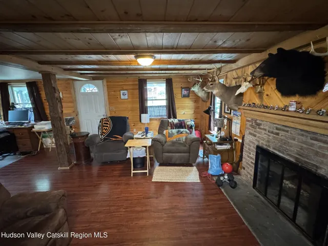 a kitchen with a sink stove and microwave