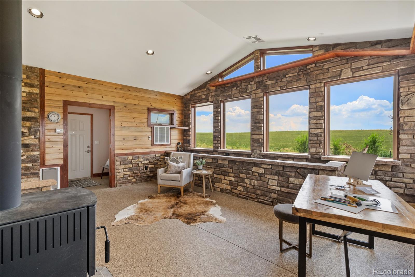 17622 County Road 1 Berthoud, CO 80513 - Photo 21 of 37 a living room with furniture and a large window