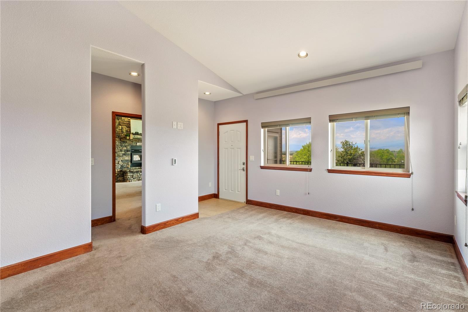 17622 County Road 1 Berthoud, CO 80513 - Photo 23 of 37 an empty room with windows and closet