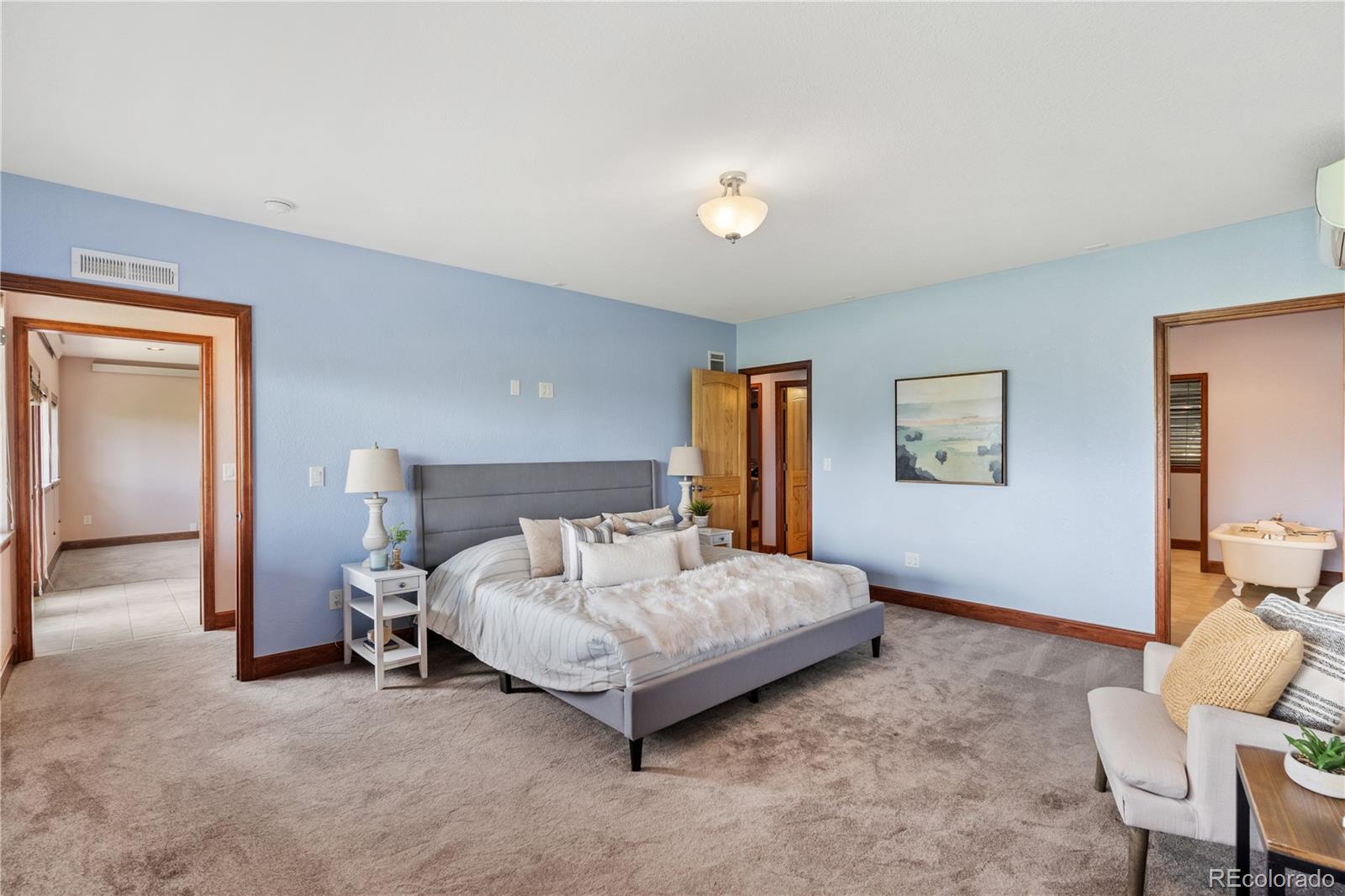 17622 County Road 1 Berthoud, CO 80513 - Photo 25 of 37 a bedroom with a bed and a chair