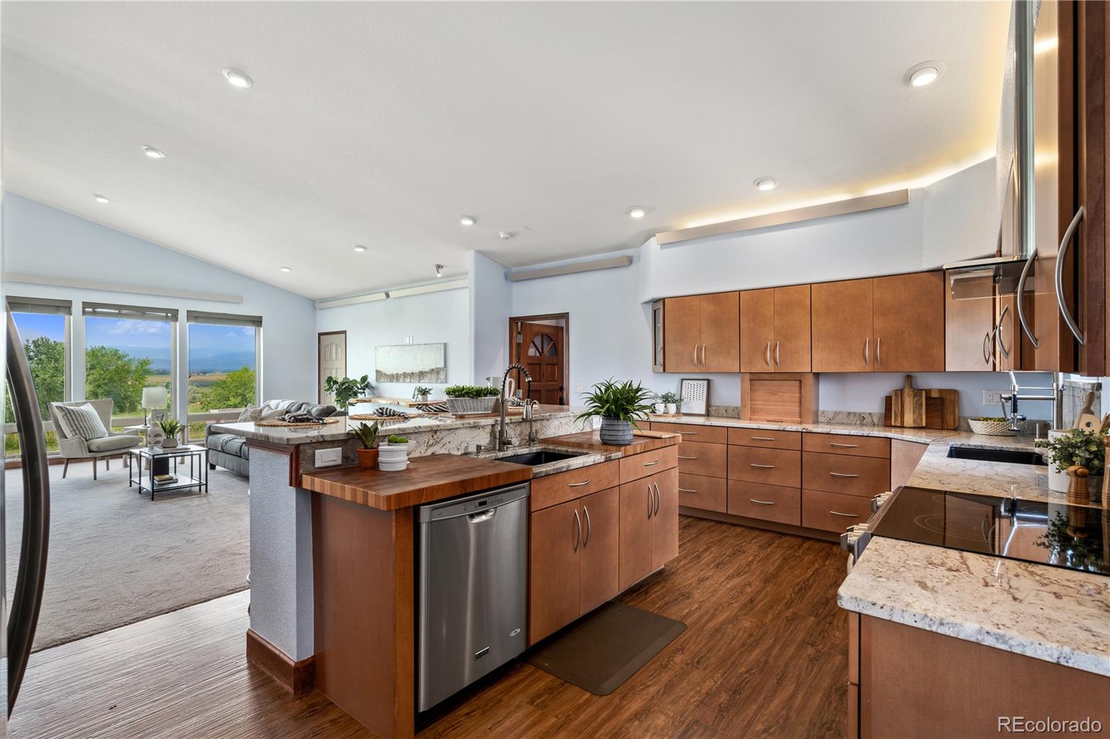 17622 County Road 1 Berthoud, CO 80513 - Photo 10 of 37 a kitchen with a sink stove and cabinets