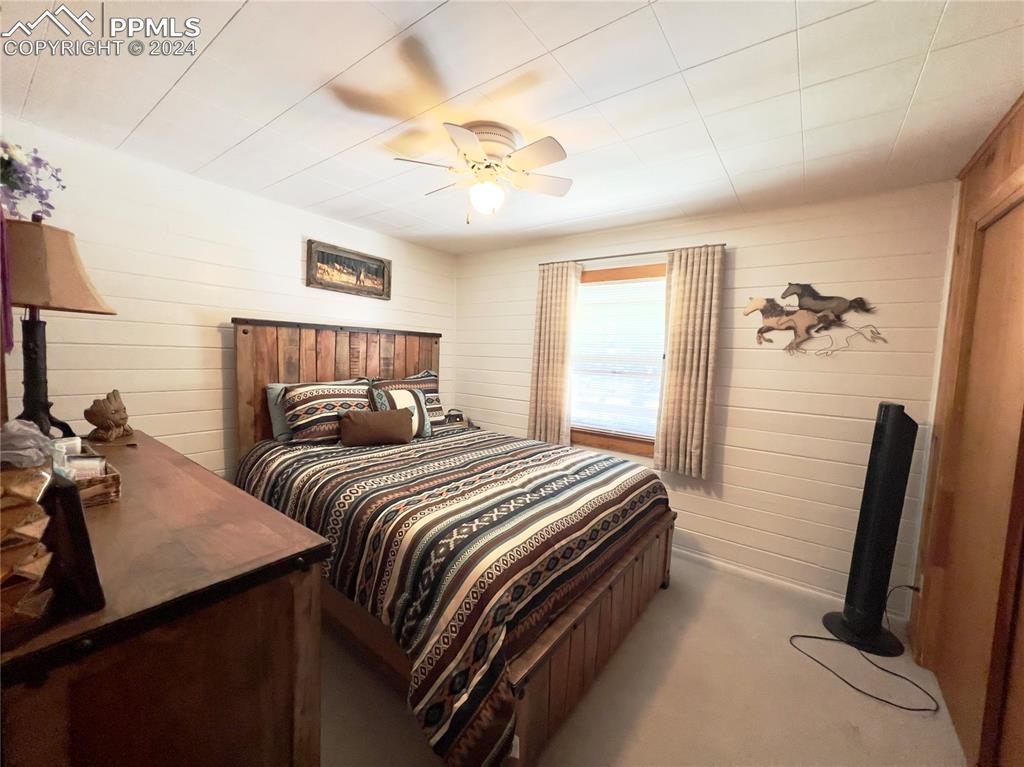 8149 Patti Drive Rye, CO 81069 - Photo 15 of 27 a bed room with a bed and a dresser