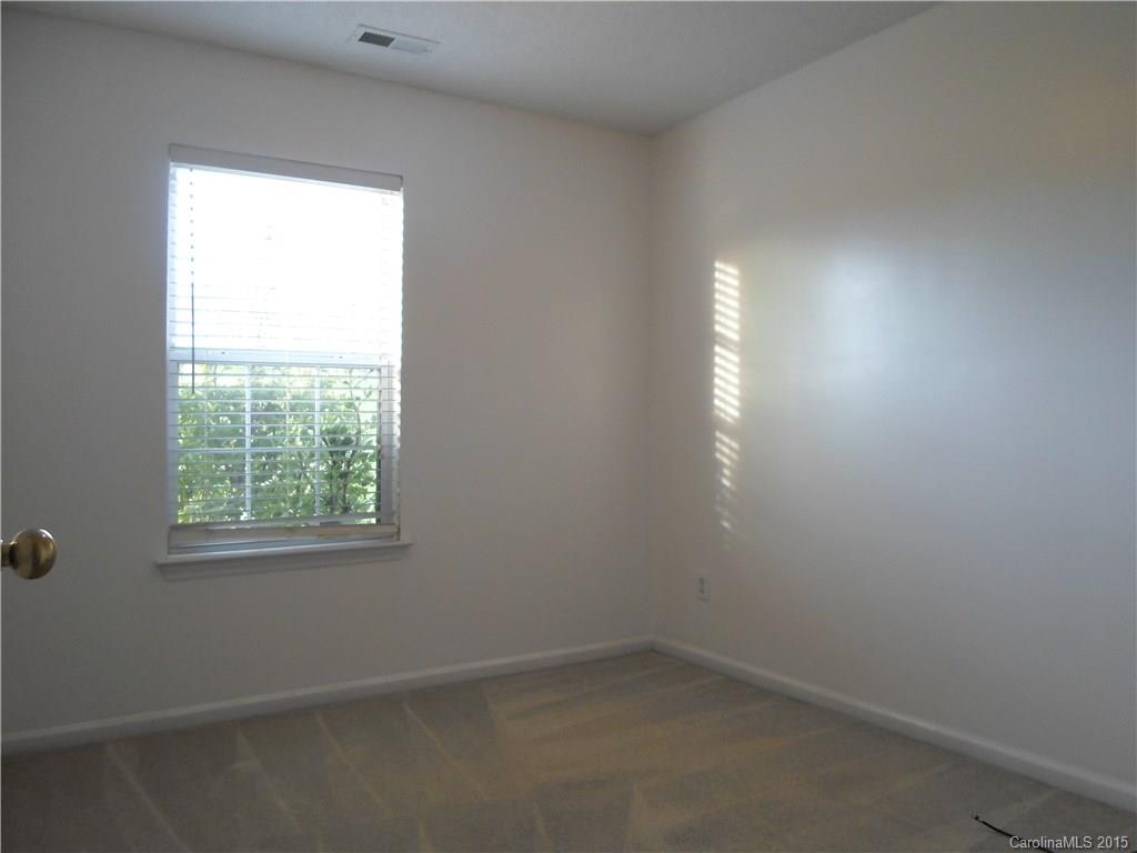 4310 Frank Vance Road Charlotte, NC 28216 - Photo 11 of 24 an empty room with a window