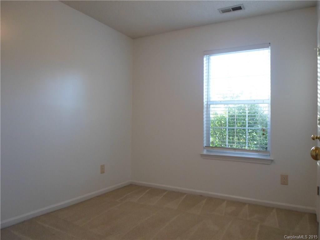 4310 Frank Vance Road Charlotte, NC 28216 - Photo 12 of 24 an empty room with a window