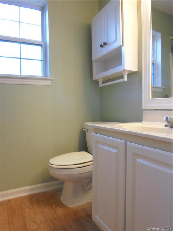 4310 Frank Vance Road Charlotte, NC 28216 - Photo 17 of 24 a bathroom with a sink and a toilet