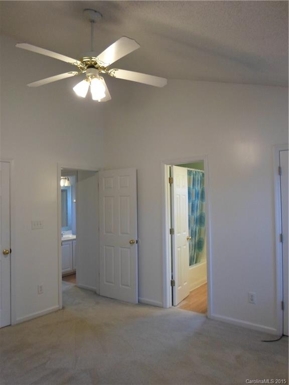 4310 Frank Vance Road Charlotte, NC 28216 - Photo 18 of 24 an empty room with fan and entrance