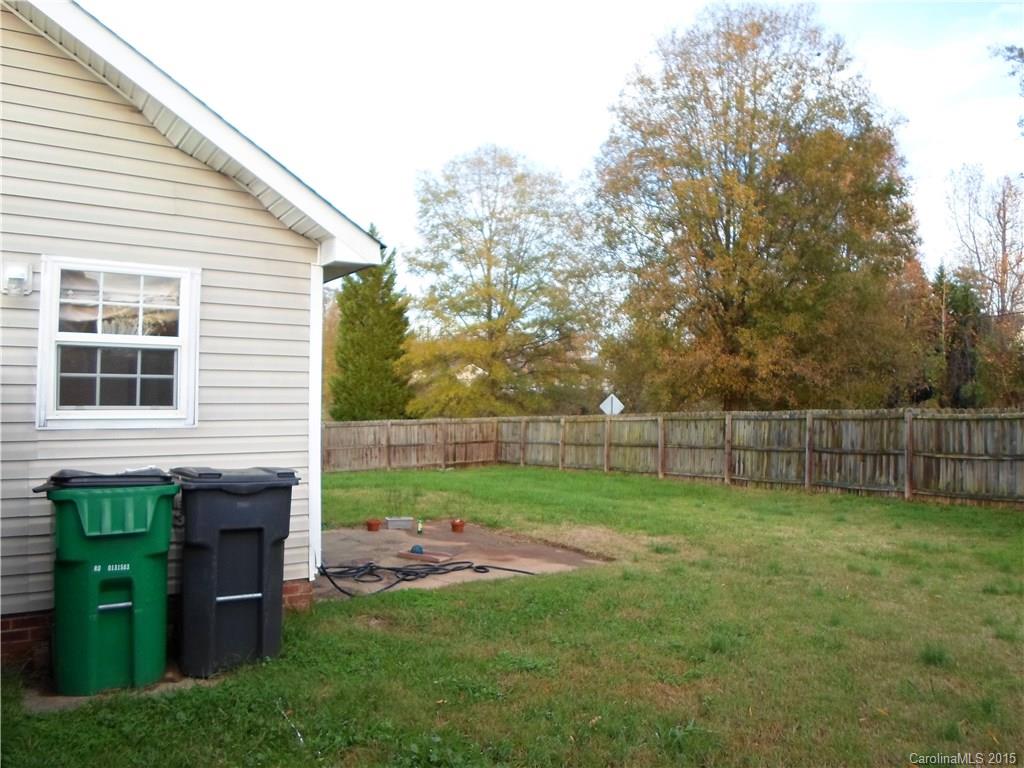 4310 Frank Vance Road Charlotte, NC 28216 - Photo 24 of 24 a view of a backyard with plants and large trees