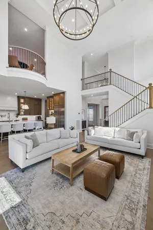 a living room with furniture fireplace and a flat screen tv