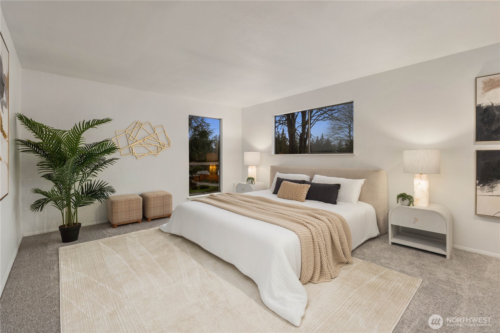 25330 215th Place Southeast Maple Valley, WA 98038 - Photo 23 of 40 a bedroom with bed and a potted plant