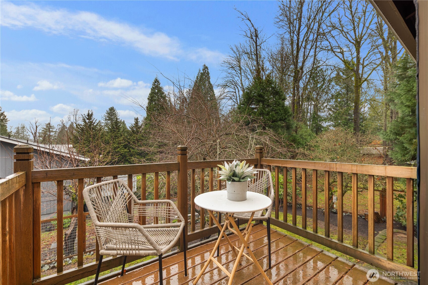 25330 215th Place Southeast Maple Valley, WA 98038 - Photo 27 of 40 a balcony with table and chairs