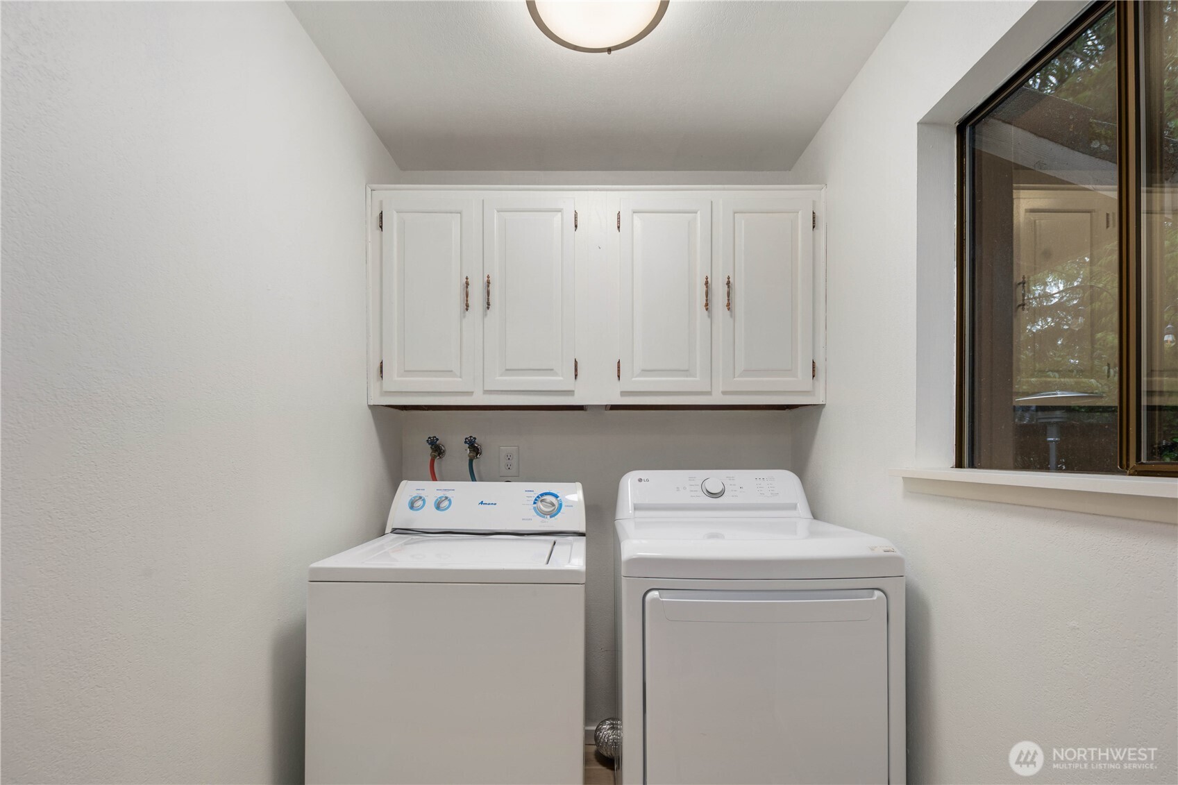25330 215th Place Southeast Maple Valley, WA 98038 - Photo 30 of 40 a utility room with dryer and washer