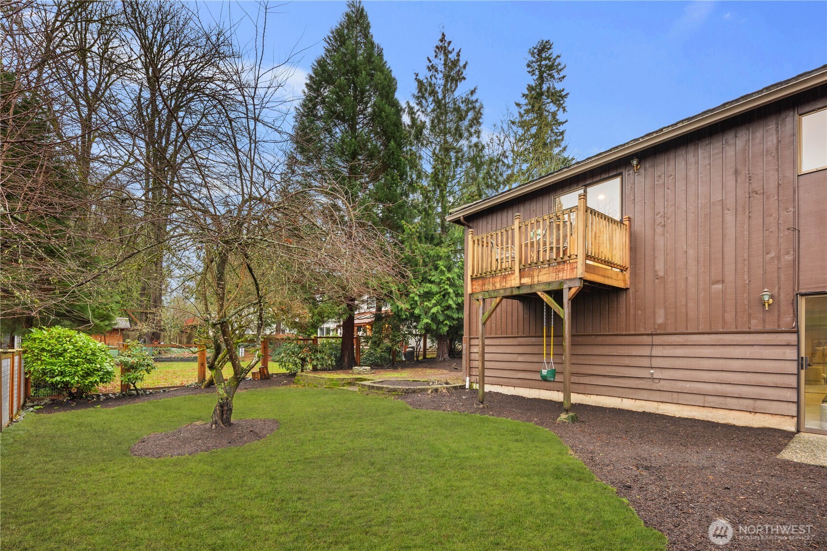 25330 215th Place Southeast Maple Valley, WA 98038 - Photo 31 of 40 a front view of a house with a yard