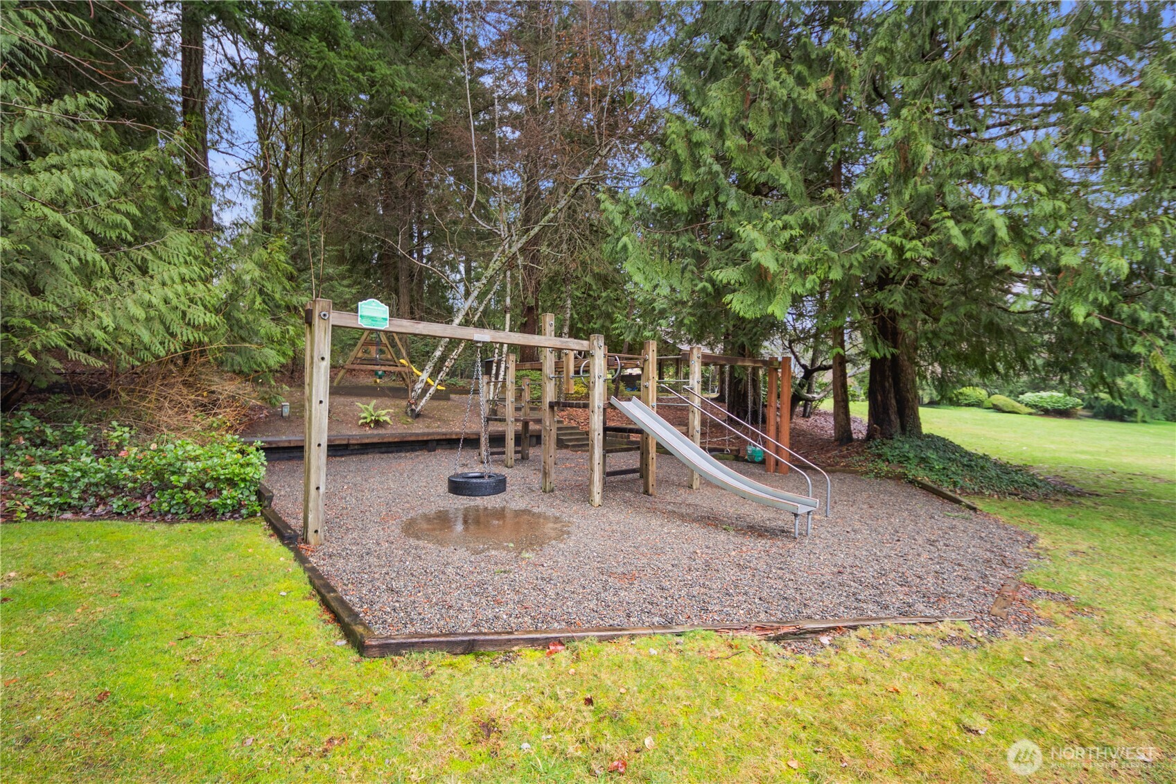 25330 215th Place Southeast Maple Valley, WA 98038 - Photo 37 of 40 a view of a house with swimming pool