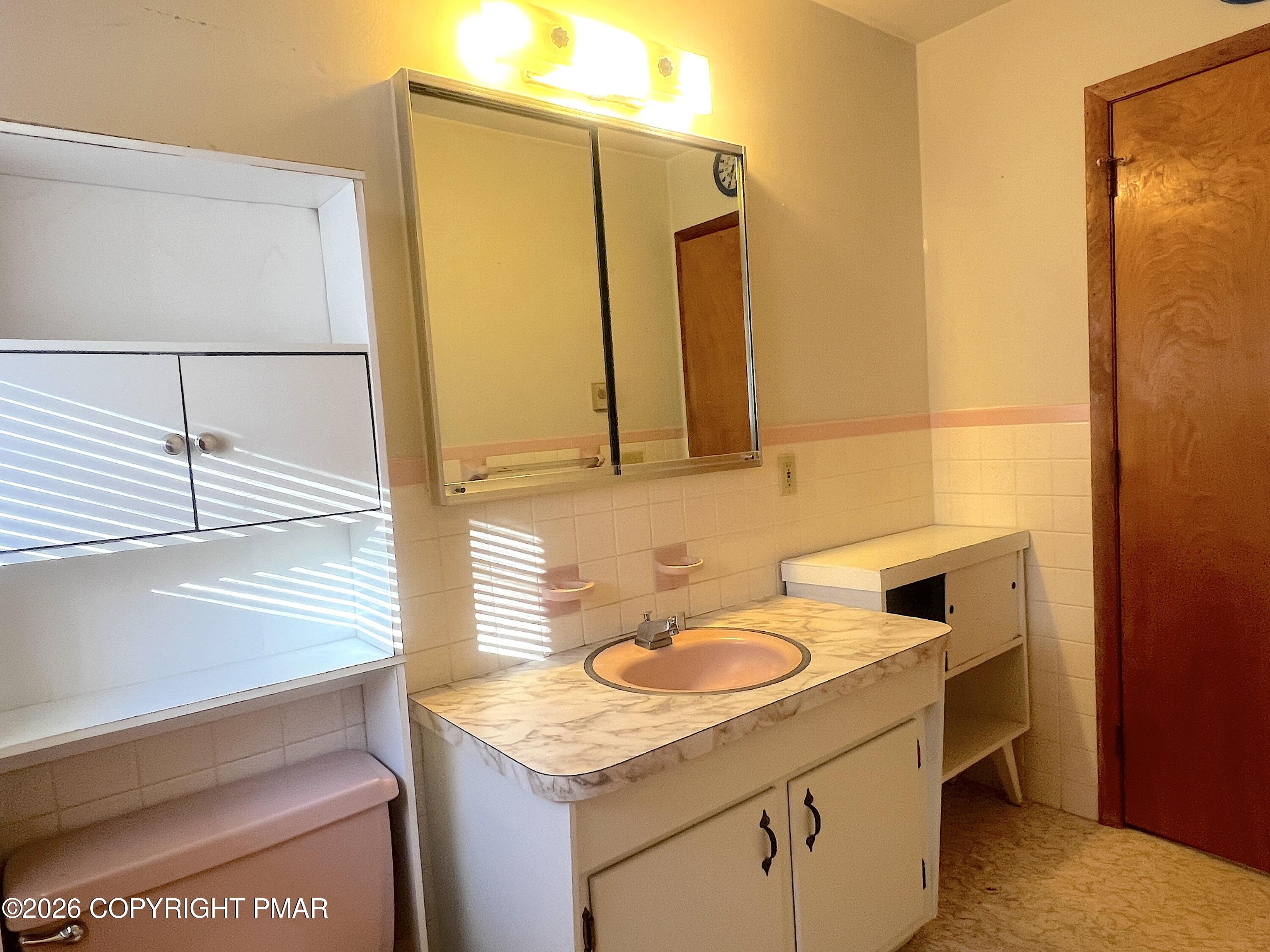 617 School Road Nazareth, PA 18064 - Photo 24 of 30 a bathroom with a sink and a mirror