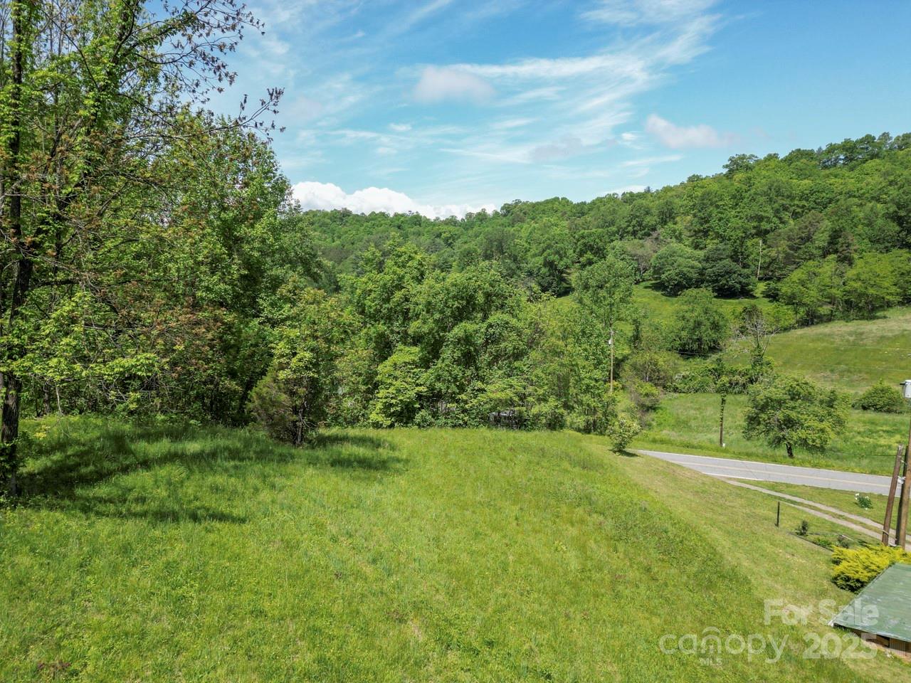 Off Of Locust Crk Road Sylva, NC 28779 - Photo 15 of 20 a view of an outdoor space and a yard