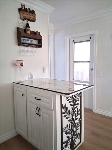 a kitchen with appliances cabinets and a window