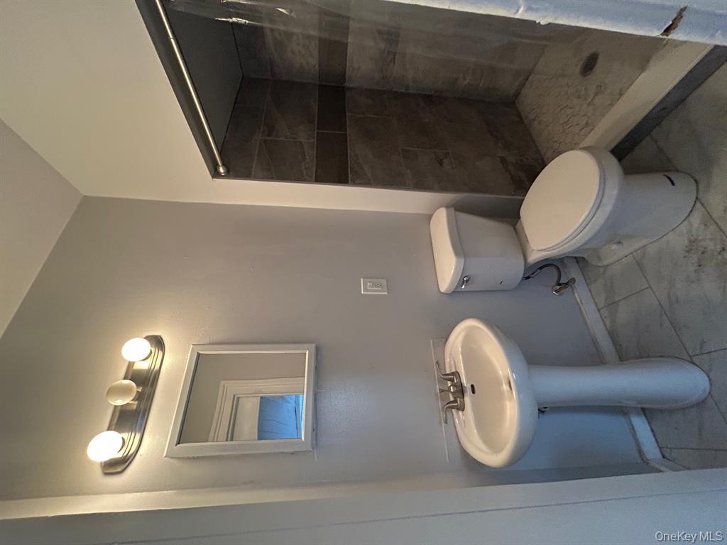 24 Lagrange Avenue Poughkeepsie, NY 12603 - Photo 4 of 10 Full bathroom with a custom tile shower
