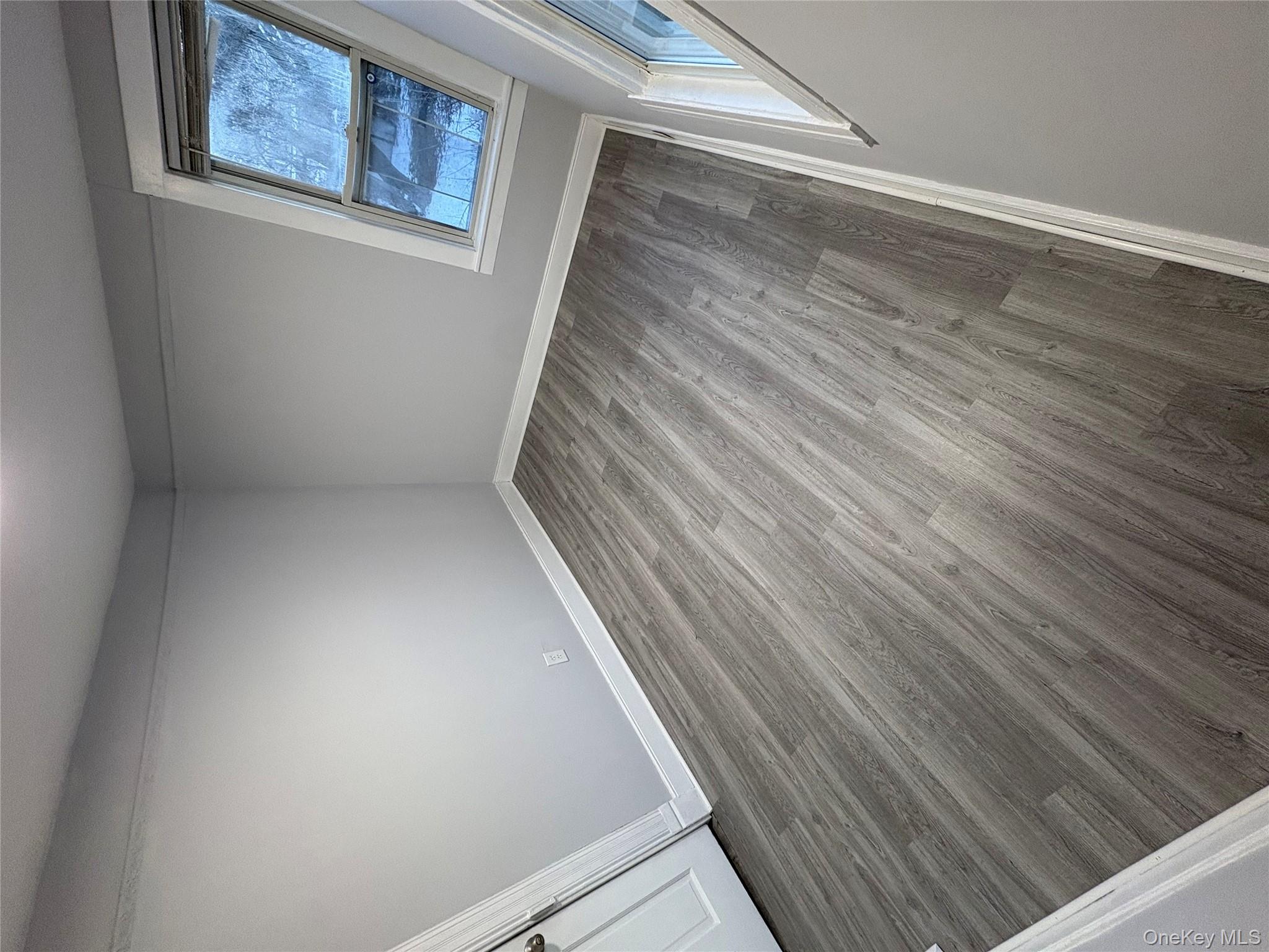 24 Lagrange Avenue Poughkeepsie, NY 12603 - Photo 5 of 10 Freshly painted BR in contemporary colors with new vinyl plank floors