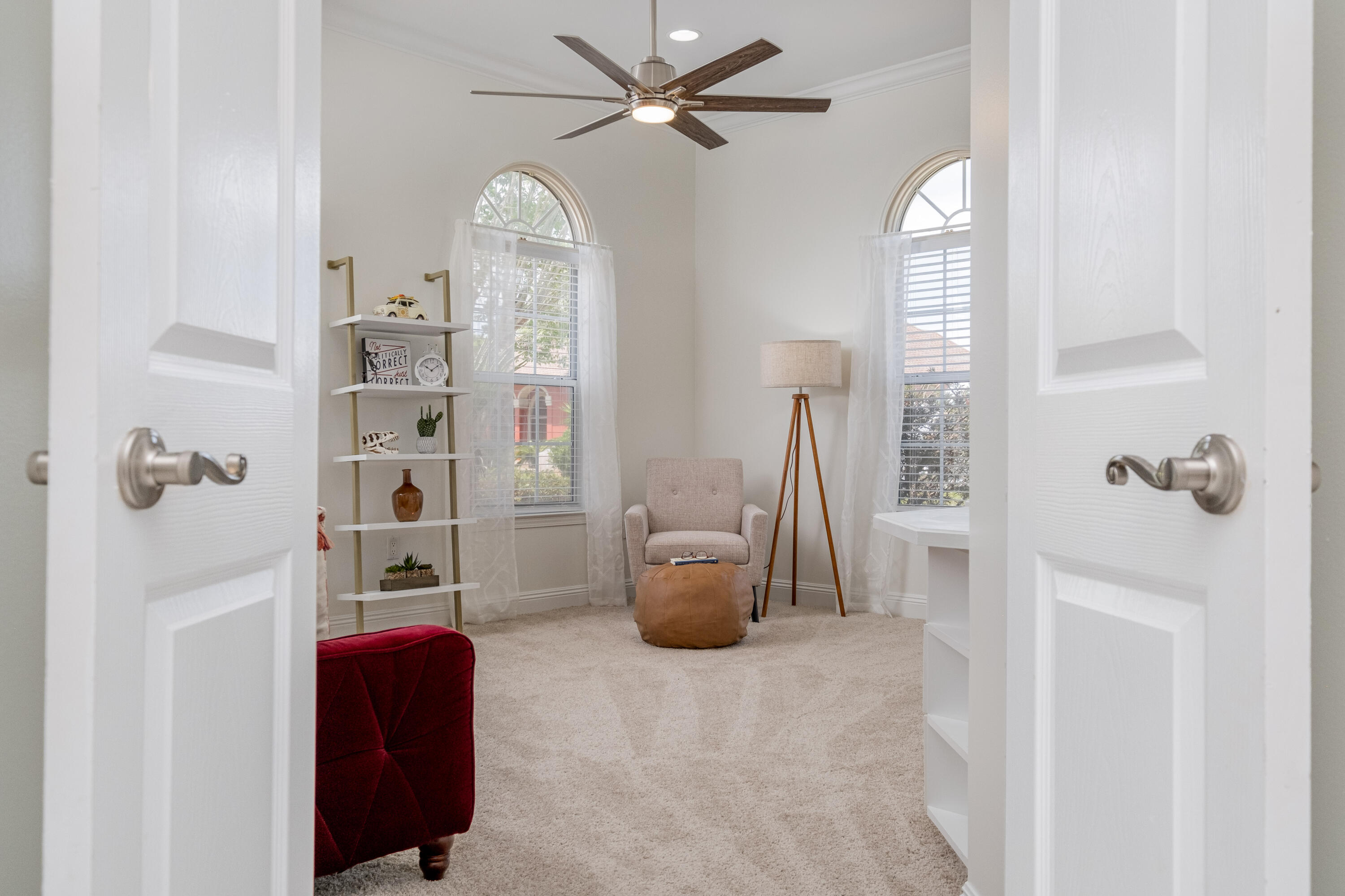 38 Kristin Cove Destin, FL 32541 - Photo 12 of 57 a living room with furniture and a chandelier