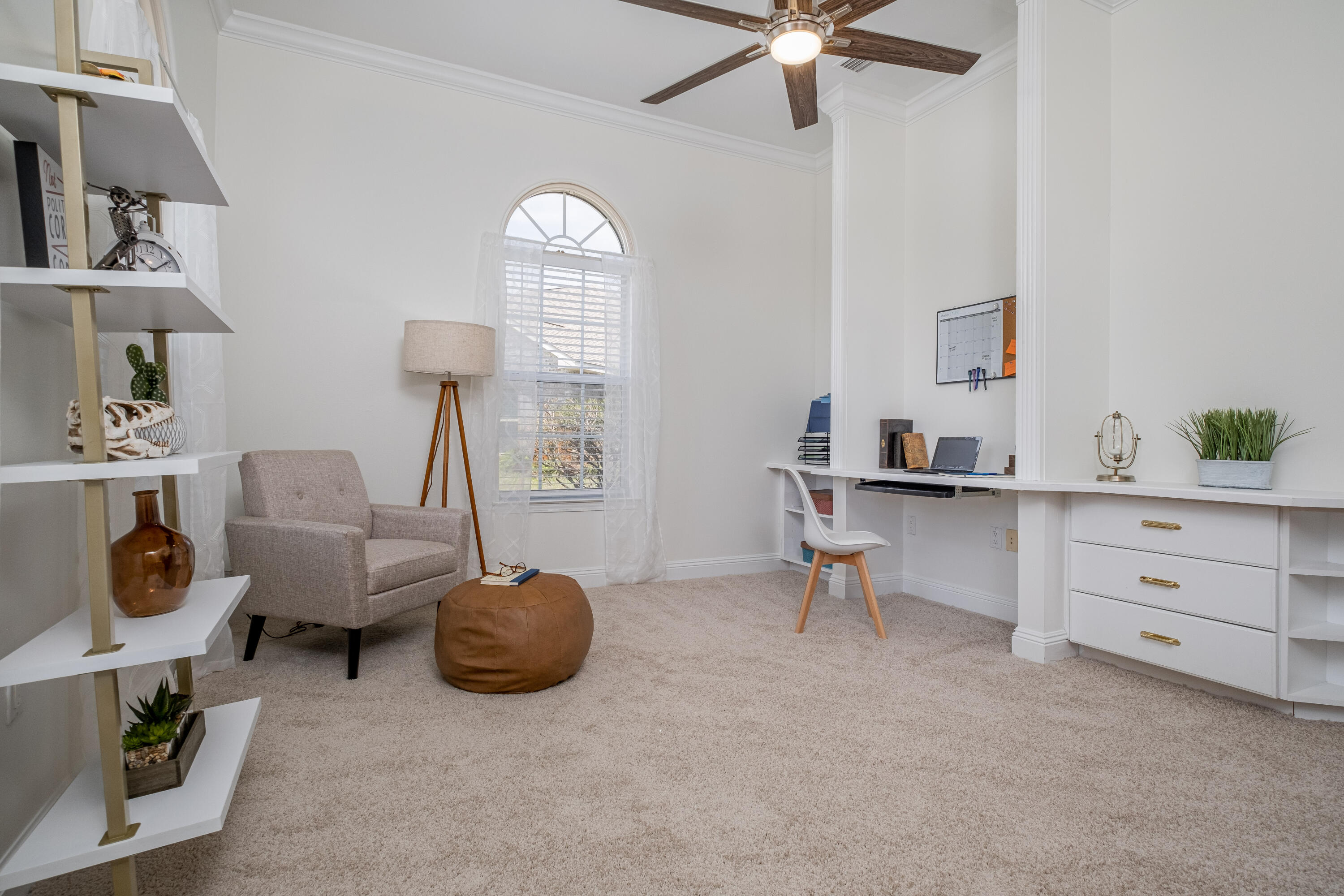 38 Kristin Cove Destin, FL 32541 - Photo 15 of 57 a living room with furniture a chandelier and a window