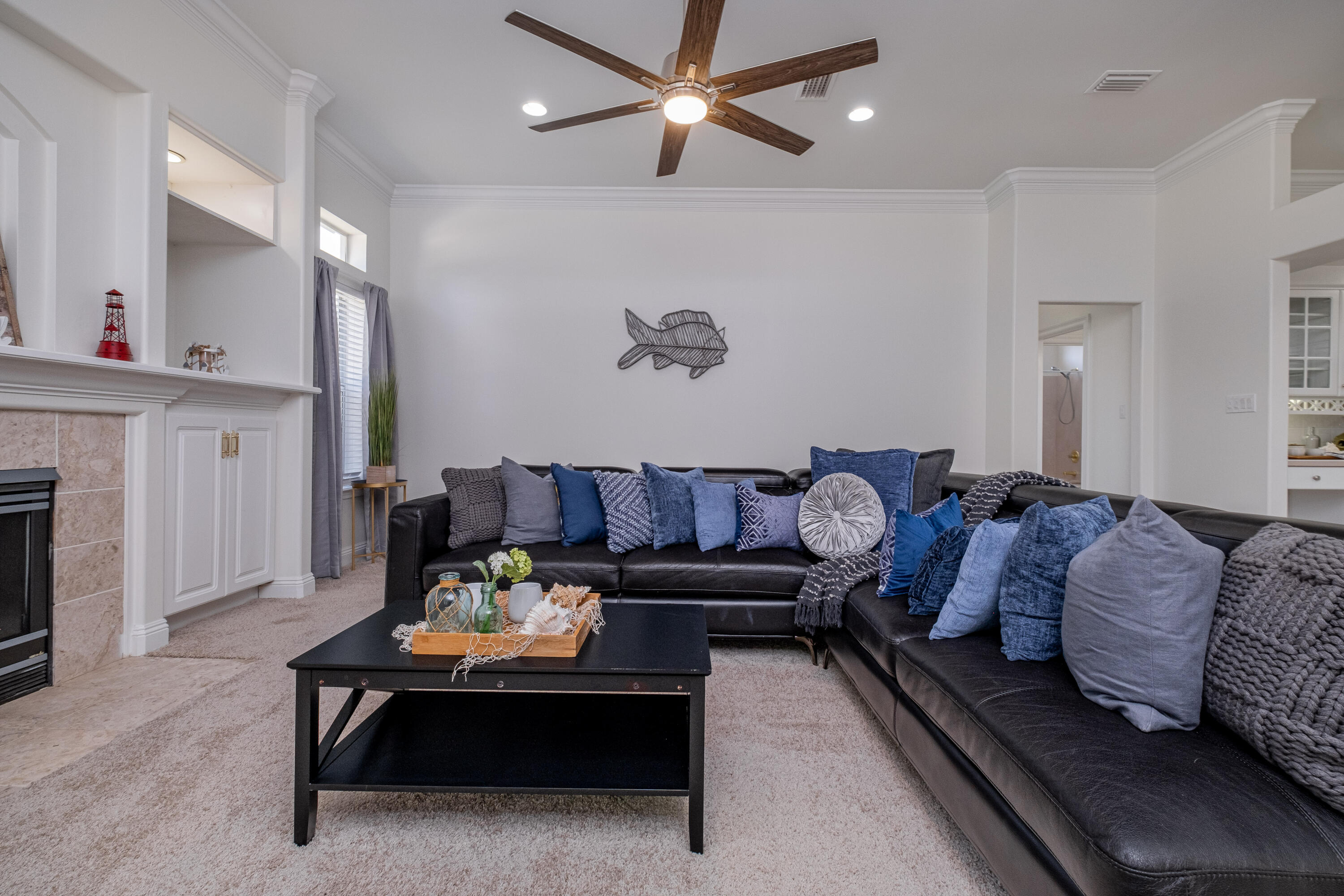 38 Kristin Cove Destin, FL 32541 - Photo 19 of 57 a living room with furniture and a fireplace