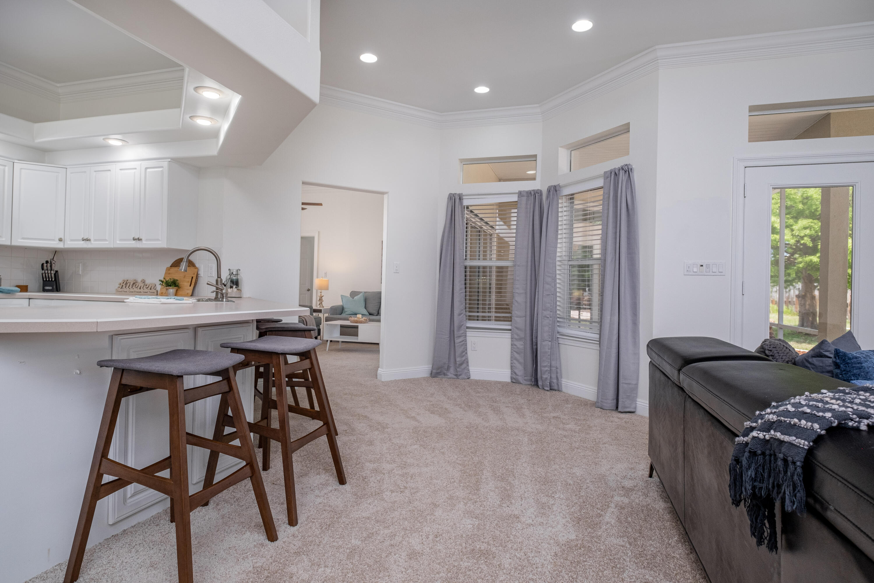 38 Kristin Cove Destin, FL 32541 - Photo 22 of 57 a kitchen with a table and chairs in it
