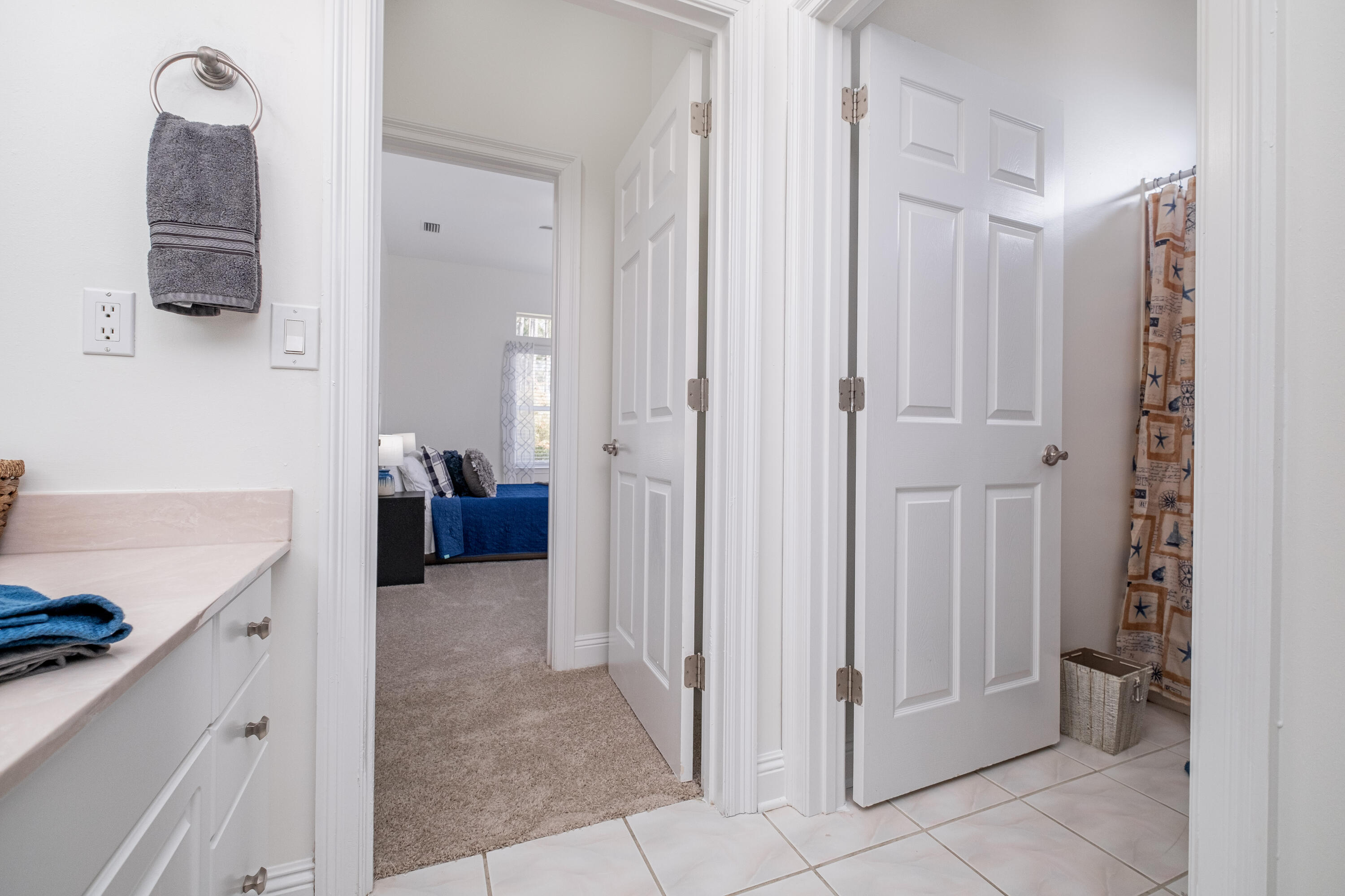 38 Kristin Cove Destin, FL 32541 - Photo 39 of 57 a view of a hallway with closet and a bathroom