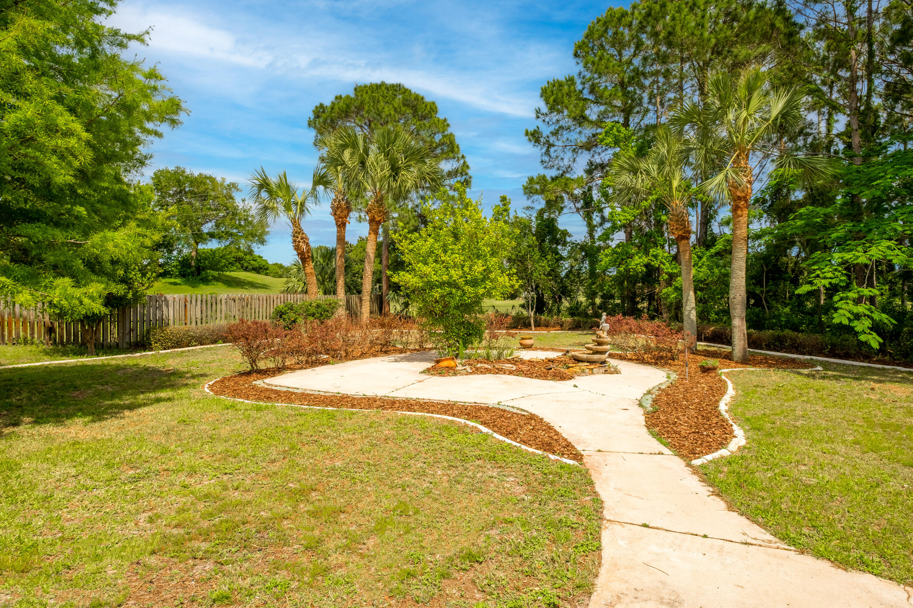 38 Kristin Cove Destin, FL 32541 - Photo 47 of 57 a swimming pool with an outdoor space and seating area