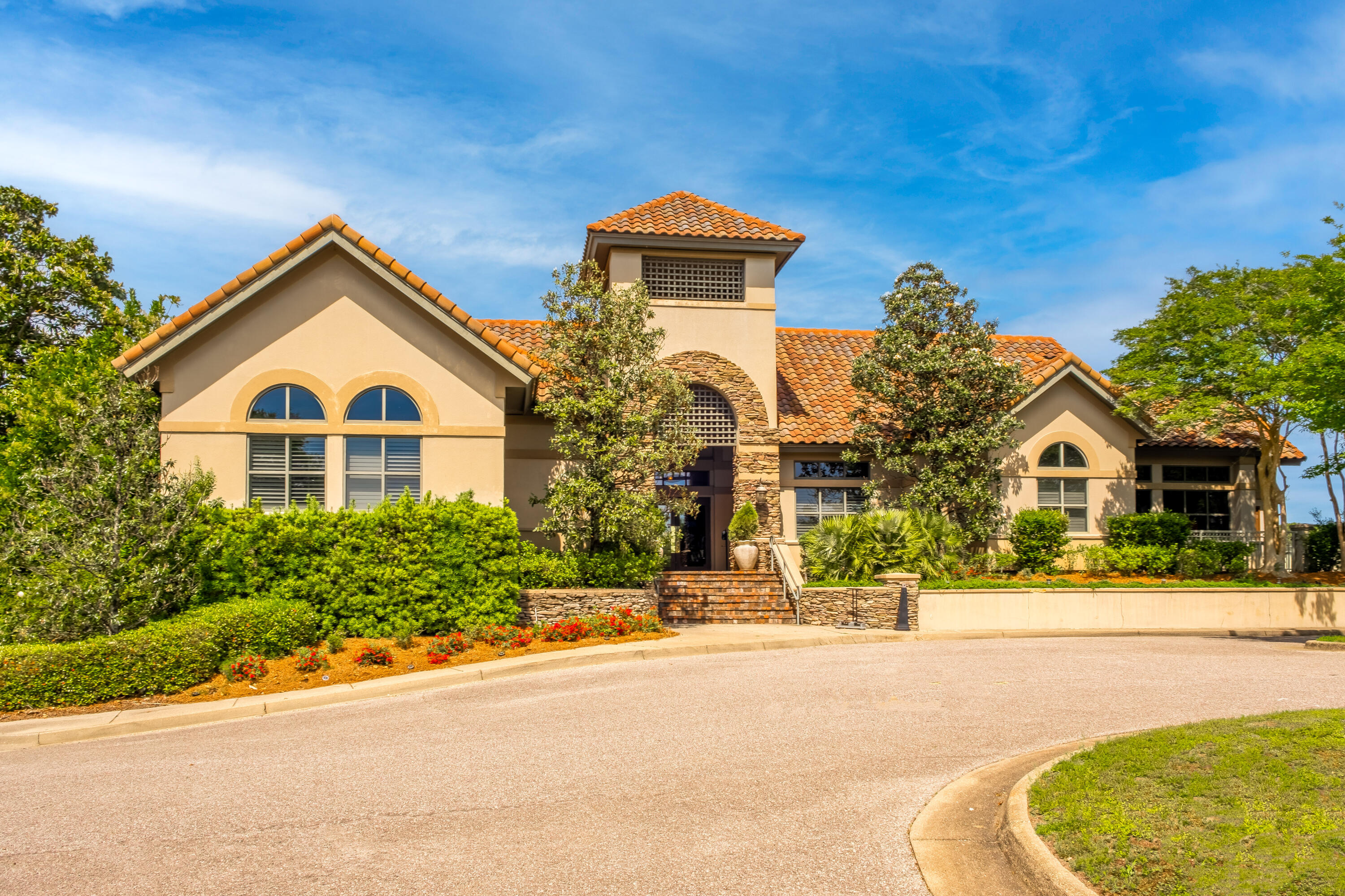 38 Kristin Cove Destin, FL 32541 - Photo 56 of 57 a front view of a house with a yard