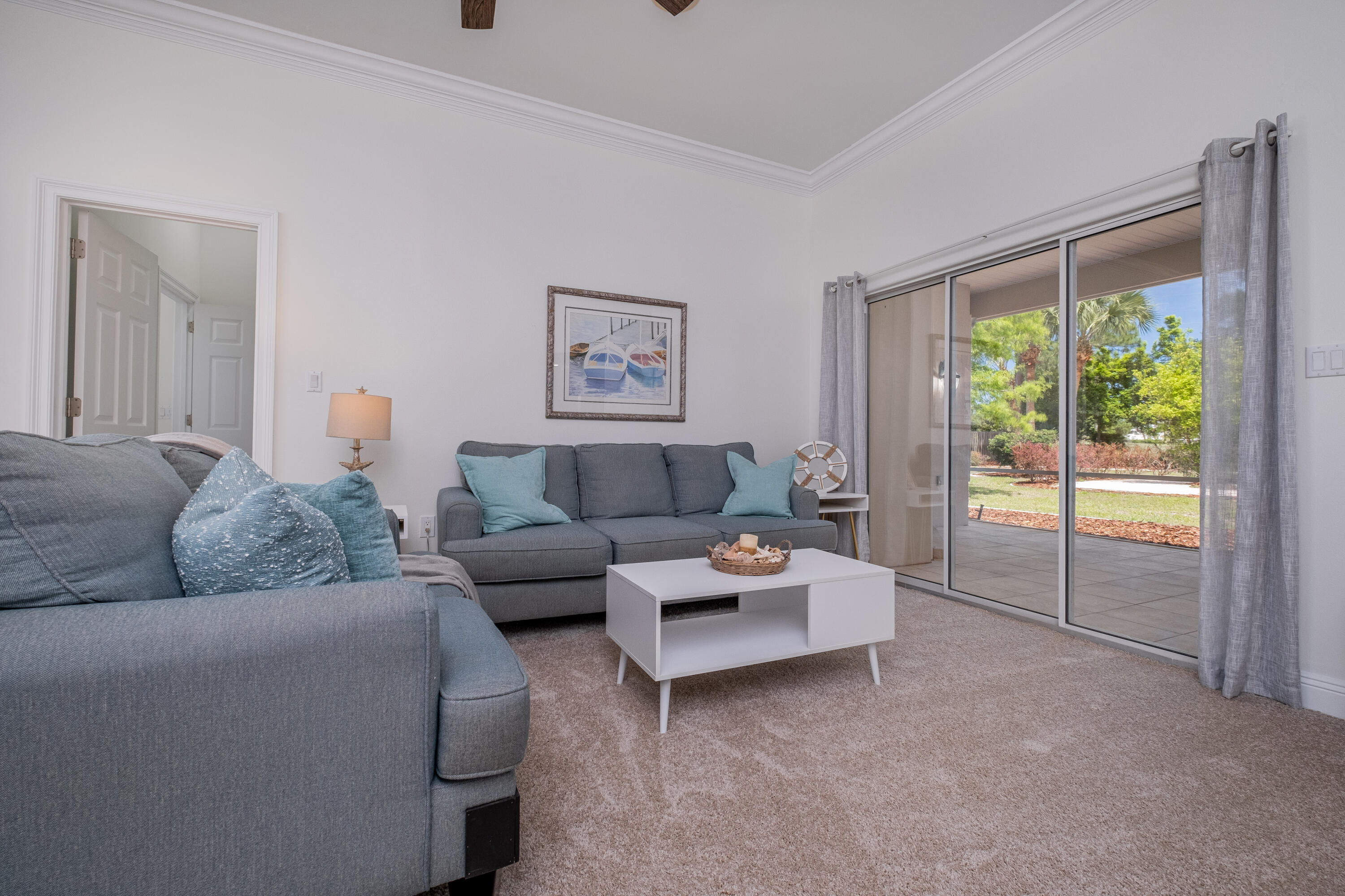 38 Kristin Cove Destin, FL 32541 - Photo 10 of 57 a living room with furniture and a large window