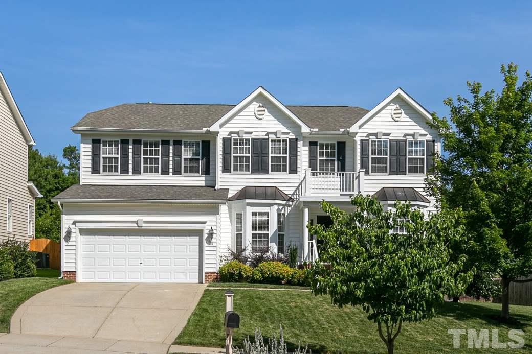 108 Quarryrock Road Holly Springs, NC 27540 - Photo 1 of 30 a front view of a house with yard and green space