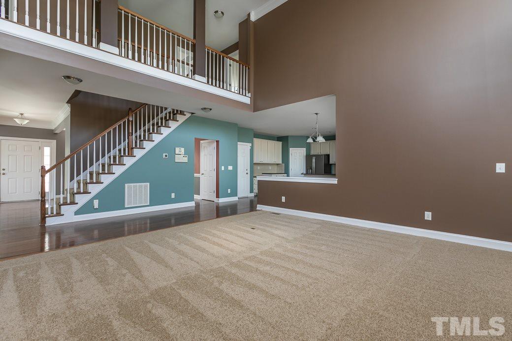 108 Quarryrock Road Holly Springs, NC 27540 - Photo 14 of 30 a view of an entryway with staircase