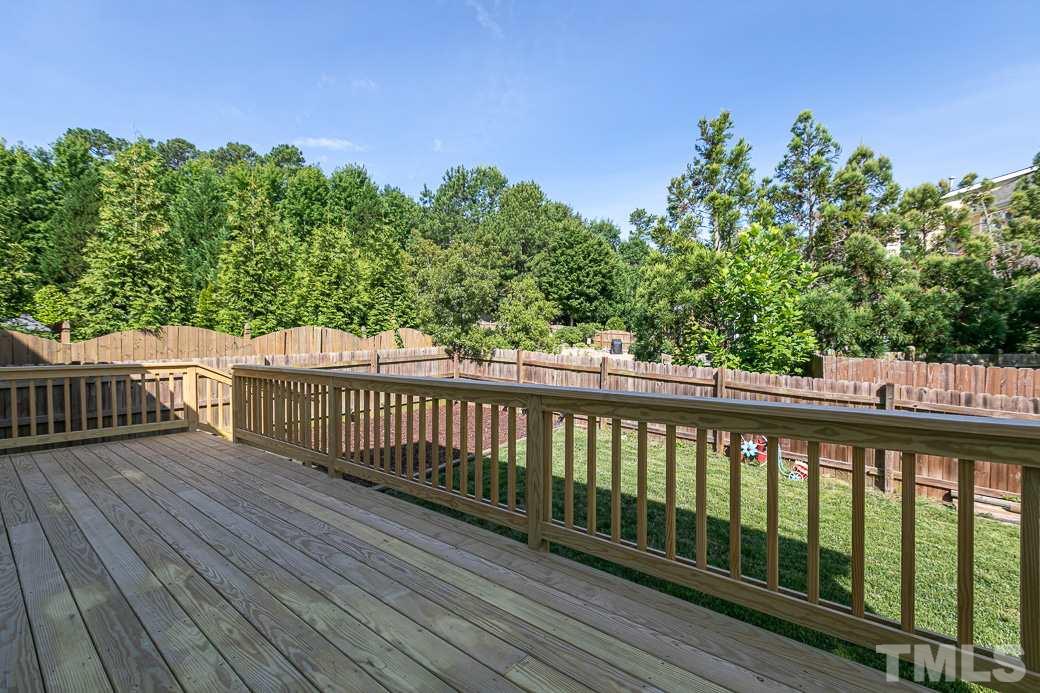108 Quarryrock Road Holly Springs, NC 27540 - Photo 25 of 30 a view of a balcony with wooden floor