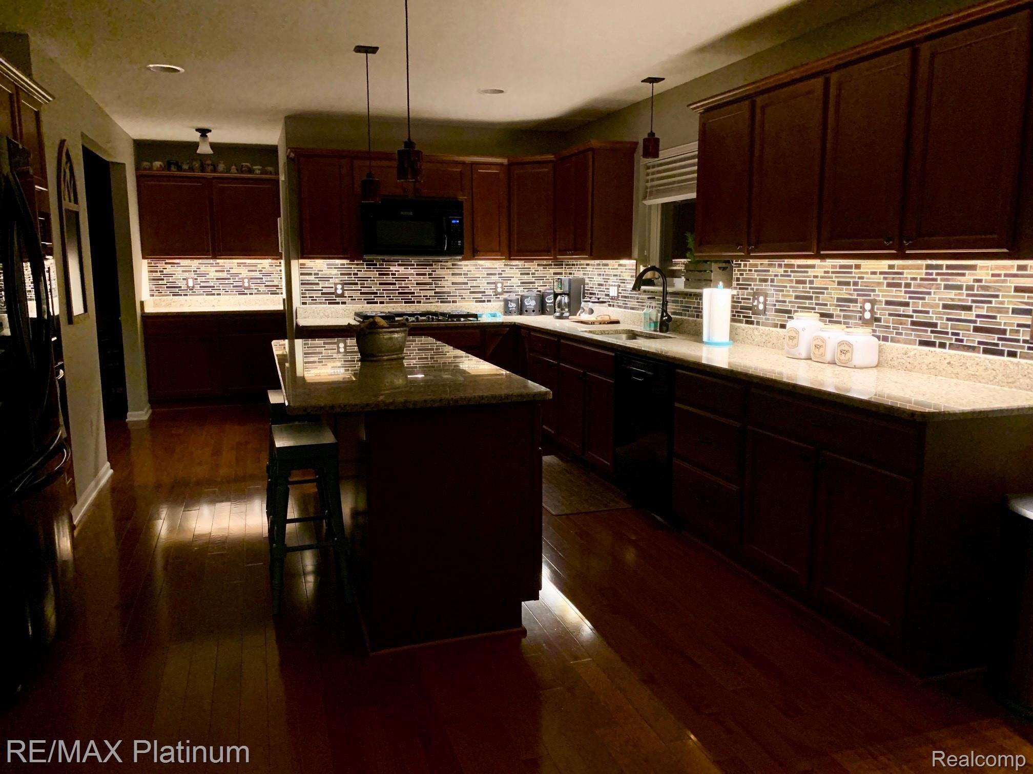 24579 Martindale Road South Lyon, MI 48178 - Photo 12 of 41 Kitchen is stunning with the under cabinet lighting!