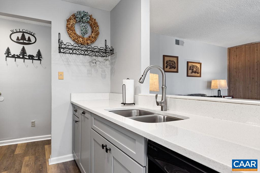 2056 Stone Ridge Roseland, VA 22967 - Photo 14 of 24 a kitchen with a sink and a refrigerator