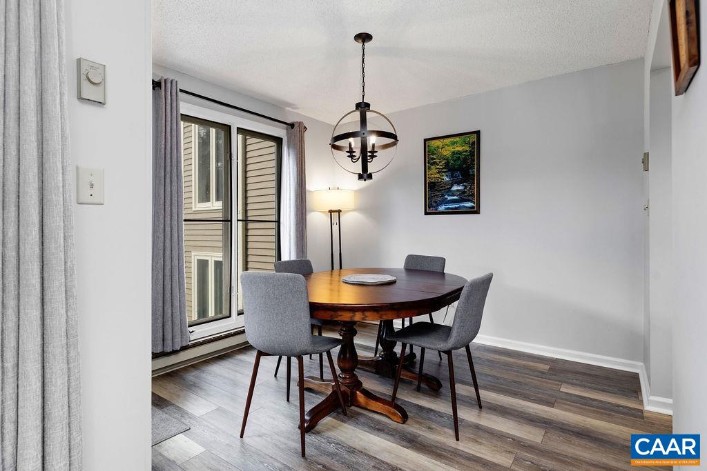 2056 Stone Ridge Roseland, VA 22967 - Photo 8 of 24 a view of a dining room with furniture window and wooden floor