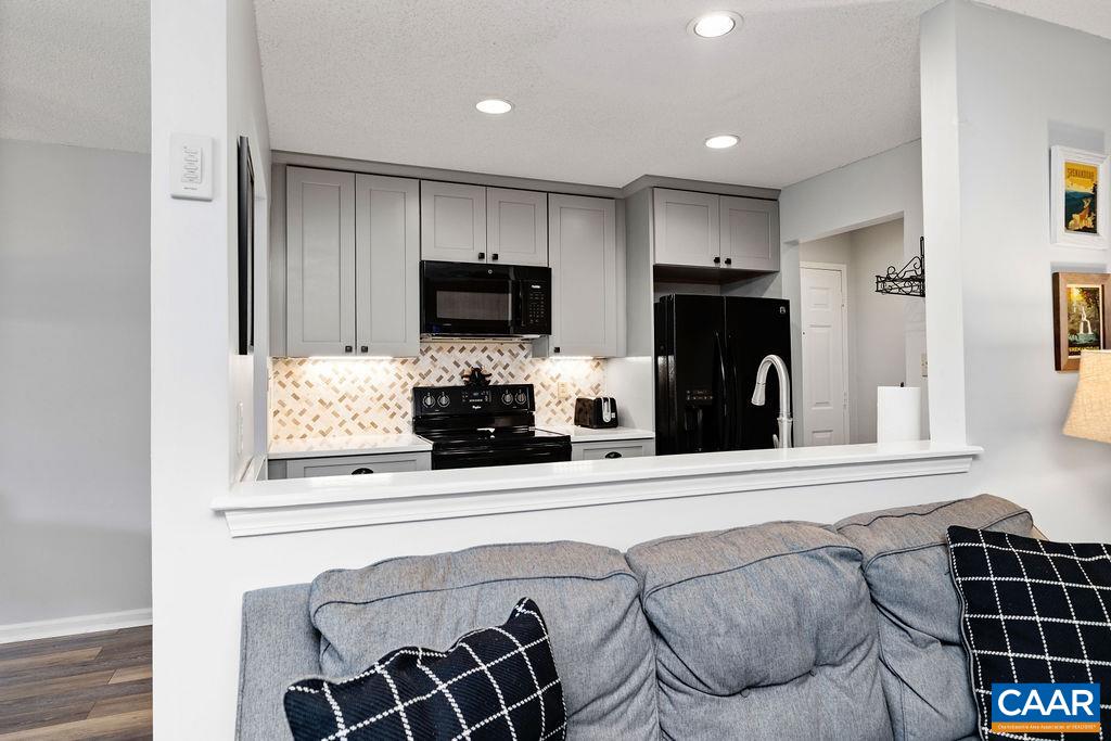 2056 Stone Ridge Roseland, VA 22967 - Photo 10 of 24 a living room with furniture and a flat screen tv