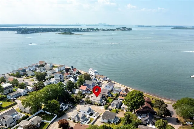 a view of a lake with a sitting area
