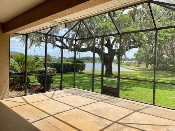 a view of backyard with green space