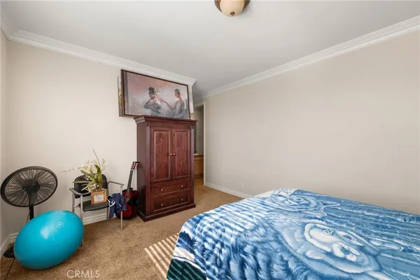 a large bathroom with a mirror and a bath tub