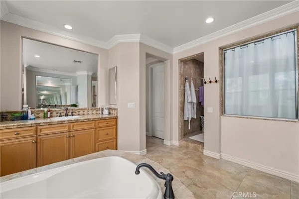 a view of a house with a yard and plants